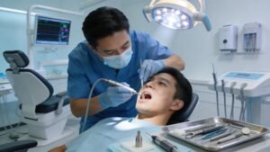 Dental professional performing a mini implant surgery showing precision and care