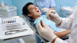 Dental professional working on mini dental implants in a modern clinic setting